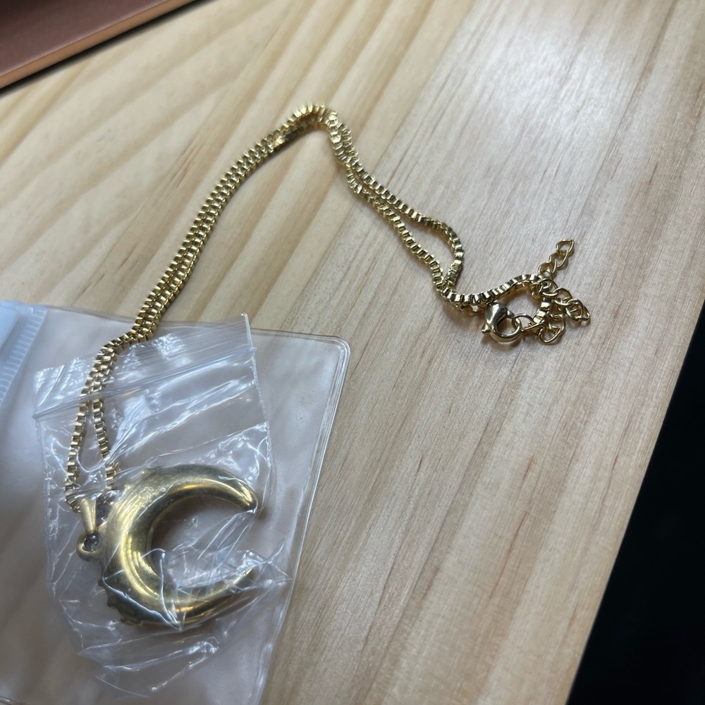 Gold moon necklace